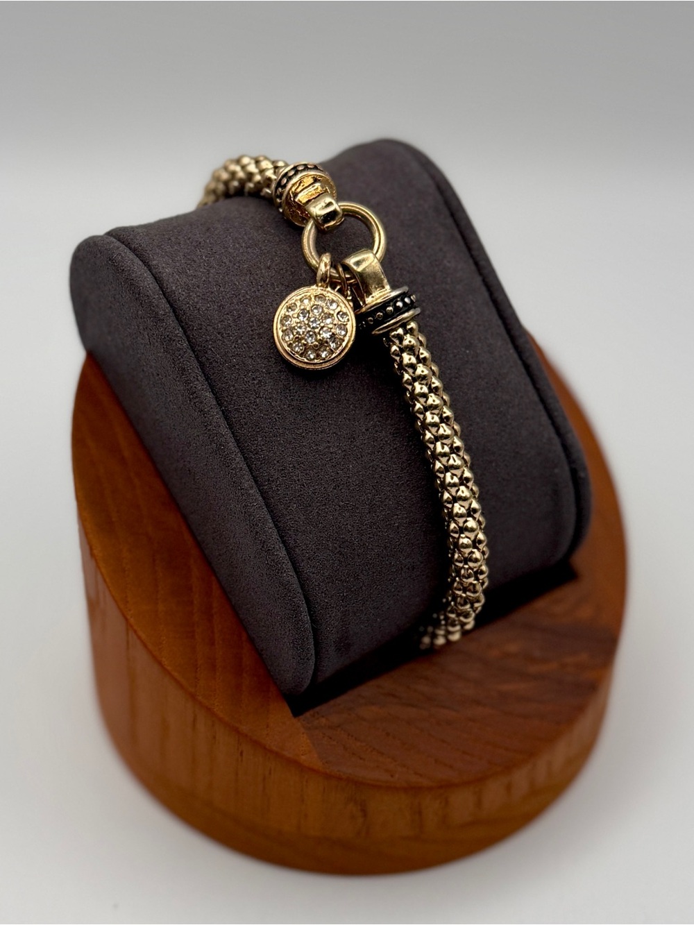 Nine West Gold Tone Textured Mesh Stretch Bracelet with Rhinestone Charm